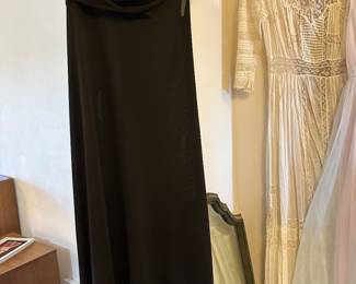 A lot of 1950s 60s ballroom or cocktail dresses The black one is Jay Pence 