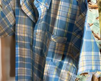 There are five brand new 1980s Columbia men’s shirts with very pretty and unusual design fabric