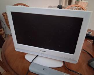 Small Toshiba TV with built in DVD player.