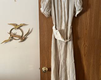 Antique dress, brass decor