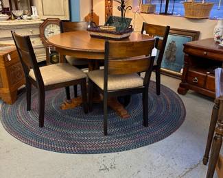 Great Round table with leaves.  4 chairs that can be sold with table or individually
