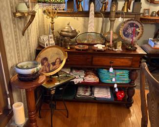 Floor candle stands, Placemats and napkins, Stain glass like lamp on gold tone base with prisims.