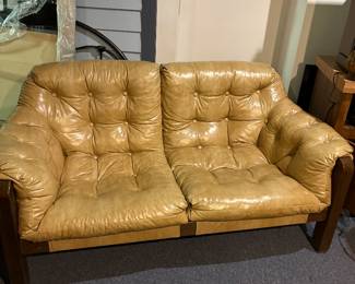 Percival Lafer  Style Sling Loveseat.   1950's tufted vinyl and wood love seat and matching chair.  Can be sold together or individually.