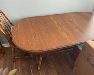 Table comes with four leaves, six chairs and pads