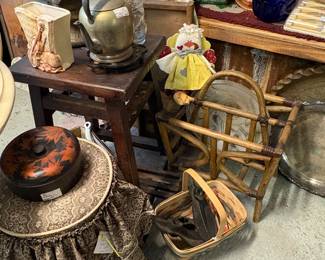 Bamboo magazine holder, vintage stool, cast iron shoe molds, and wood fern stand, figural jars, brass coffee pot