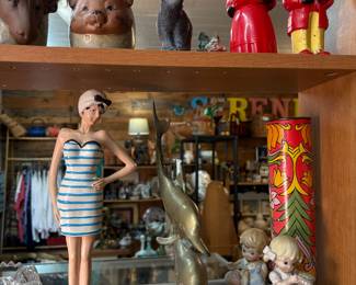 Brass dolphin statue