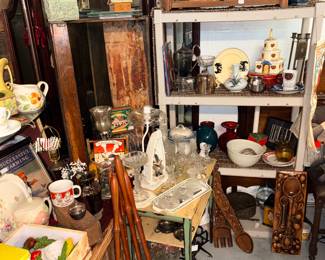 Croquet mallets, old trunk, clear glass