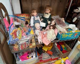 Porcelain dolls, bags of toy, bags of doll clothes 