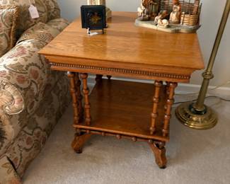 Unique Oak Eastlake square table on casters. Excellent condition.