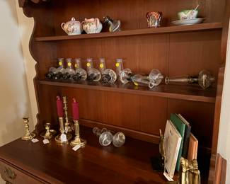Brass candlesticks, glass candelabras that sit in candlesticks