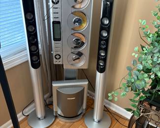 Sharper Image Vertical4 CD Radio Stereo System 2 cone tower speakers . Beautiful sound. We have not been able to get wolfer connected.