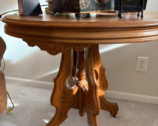 Eastlake Style 4 leg oval table.