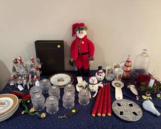 Votives and a collection of holiday wine stoppers