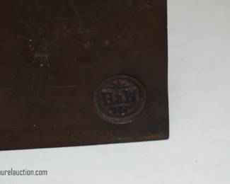 bronze bookend marking