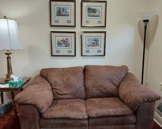 Elton Louviere duck prints with Duck Stamps
Leather double reclining loveseat