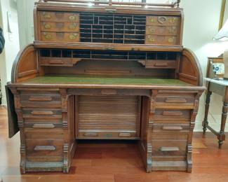 Triple roll desk with leather inlay by Indianapolis Cabinet Company, circa 1880s