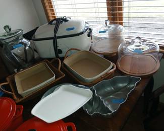 Lovely pampered chef pans w baskets, cake stands , boards for party’s 