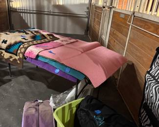 Horse pads for saddles & travel bags for carry all like new multi colors 
Prices to sell! 
