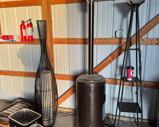 Heated propane heater , put door lights , floor lamp 
Dog bowl set 