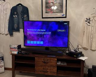 Vizzo tv and surround sound. 
Lovely solid wood TV stand 