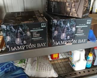 New lights, used lights , fence post lights in box 