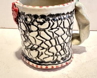 Unique Mug with Red and Black Details 