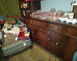 Mahogany buffet, Upholstered chair and blankets and tapestries!