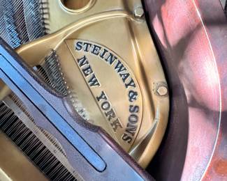 Steinway baby grand piano in walnut. Has not been serviced for several decades. Dimensions are 61"L (not including keyboard with adds 6")  x 57"L x 38"H. Entertaining offers and happy to meet on site to inspect the item.