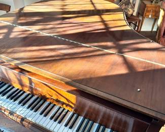 Steinway baby grand piano in walnut. Has not been serviced for several decades. Dimensions are 61"L (not including keyboard with adds 6")  x 57"L x 38"H. Entertaining offers and happy to meet on site to inspect the item.