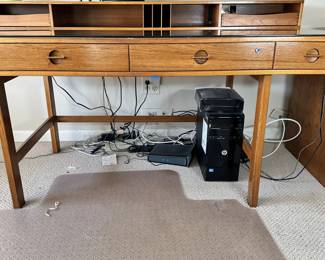 ALTERNATE VIEW: Lovig Mid Century Teak Desk. In good condition with normal wear. Top has been protected with fitted glass. Measurements: 64"W x 28 1/2"D x 29"H. AVAILABLE FOR: $2100