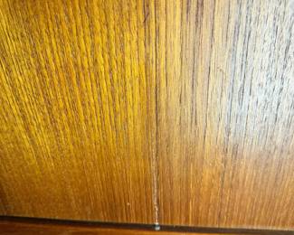 ALTERNATE VIEW: Teak Sideboard (Condition: bottom drawer needs adjustment to close completely. There is a vertical hairline separation on the right side of the sliding panel). Measurements: 32"H x 47 1/2"L x 18 1/2"D. AVAILABLE FOR: $800