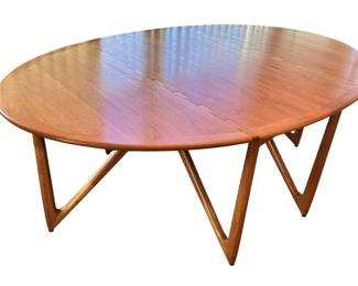 ALTERNATE VIEW: 1970s Teak Niels Koefoed Gateleg Dining Table. In very good condition with a few imperfections to the top as shown in photos. Measures (Open) 77"L x 51"W x 29"H. (Closed) 28"W.  AVAILABLE FOR:  $1800