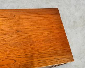 ALTERNATE VIEW: Teak Sideboard (Condition: bottom drawer needs adjustment to close completely. There is a vertical hairline separation on the right side of the sliding panel). Measurements: 32"H x 47 1/2"L x 18 1/2"D. AVAILABLE FOR: $800