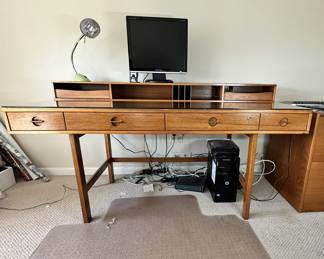 ALTERNATE VIEW: Lovig Mid Century Teak Desk. In good condition with normal wear. Top has been protected with fitted glass. Measurements: 64"W x 28 1/2"D x 29"H. AVAILABLE FOR: $2100