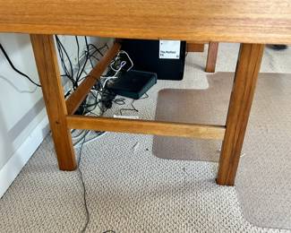 ALTERNATE VIEW: Lovig Mid Century Teak Desk. In good condition with normal wear. Top has been protected with fitted glass. Measurements: 64"W x 28 1/2"D x 29"H. AVAILABLE FOR: $2100