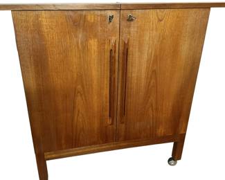 ALTERNATE VIEW: Bruksbo Danish teak Bar Cart. 
30.25" wide closed, 60.5" wide open, 16.25" deep, 35" high. AVAILABLE FOR - $1100