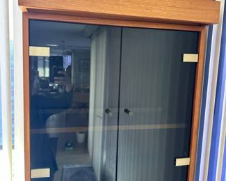 ALTERNATE VIEW: 3 Piece Danish Modern Teak Cabinet with Smoked Glass Doors. In very good condition. Measures approximately 75"H x 12" and 16"D x 24"W. AVAILABLE FOR $500.