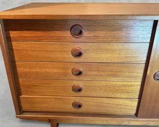 ALTERNATE VIEW: Teak Sideboard (Condition: bottom drawer needs adjustment to close completely. There is a vertical hairline separation on the right side of the sliding panel). Measurements: 32"H x 47 1/2"L x 18 1/2"D. AVAILABLE FOR: $800