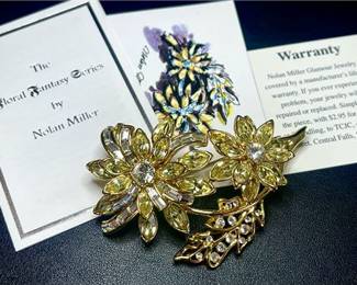 Lot 180   1 Bid(s)
Vintage Nolan Miller Glamour Jewelry Floral Fantasy Brooch – Yellow & Clear Crystal