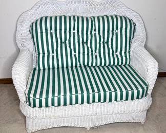 White Wicker Settee With Green and White Striped Cushion 