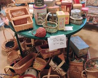 Baskets baskets baskets and tins, sewing machine with very nice sewing desk and sewing mats, all the accessories and patterns. 
