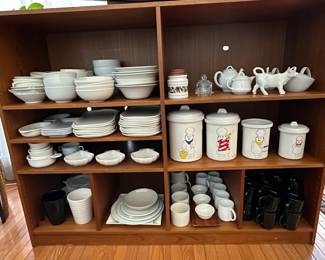 Collection of white plates, canisters and assorted servers