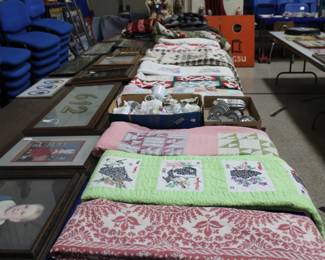 Several handmade quilts.