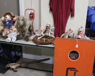 BGSU corn hole game, child's chair and teddy bears, early straw stuffed riding dog, stocking monkeys, vintage clothing.