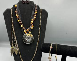 Assortment Of Chicos Necklaces With Matching Earrings And Bracelets