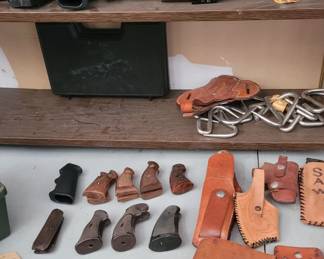 Handgun grips/stocks, sheaths, binoculars