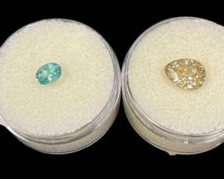 2 Loose Faceted Aqua and Pale Peach Semi Precious Stones
