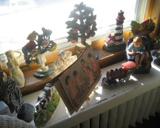 Collection of door stops and collectible quintuplet memorabilia