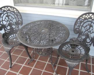 Wrought iron bistro table and chairs
