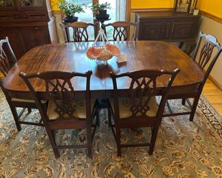Antique Chippendale dinning room table, 7 leaves, 6 chairs